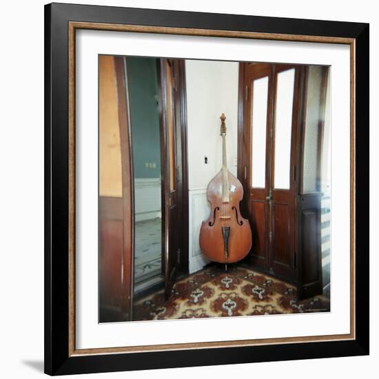 Double Bass Propped Against a Wall, Cienfuegos, Cuba, West Indies, Central America-Lee Frost-Framed Photographic Print