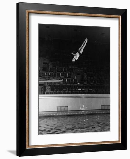 Double Twister Dive by Ohio State University Diver Miller Anderson, NCAA Swimmer of the Year-Gjon Mili-Framed Photographic Print