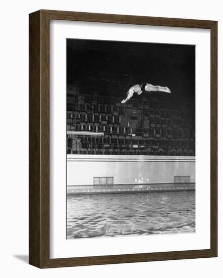 Double Twister Dive by Ohio State University Diver Miller Anderson, NCAA Swimmer of the Year-Gjon Mili-Framed Photographic Print