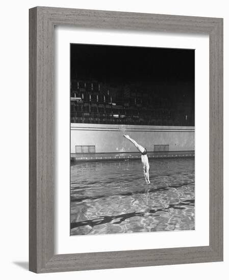 Double Twister Dive by Ohio State University Diver Miller Anderson, NCAA Swimmer of the Year-Gjon Mili-Framed Photographic Print