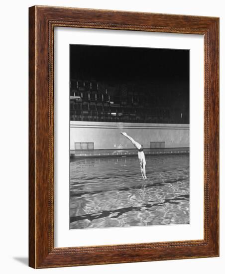 Double Twister Dive by Ohio State University Diver Miller Anderson, NCAA Swimmer of the Year-Gjon Mili-Framed Photographic Print