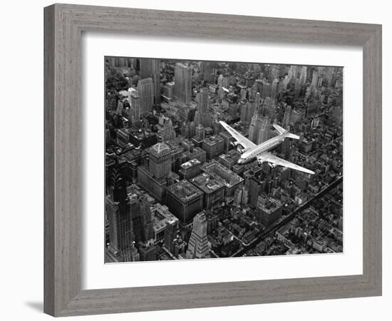 Douglas 4 Flying over Manhattan-Margaret Bourke-White-Framed Premium Photographic Print