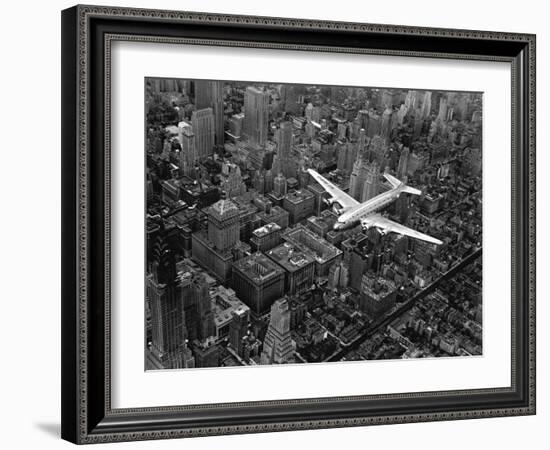 Douglas 4 Flying over Manhattan-Margaret Bourke-White-Framed Photographic Print