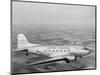 Douglas Dc-3 Plane in Flight-null-Mounted Photographic Print