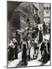 Douglas Fairbanks Senior Playing Petruchio as He Rides into Town Facing Backwards on a Jackass-null-Mounted Photographic Print