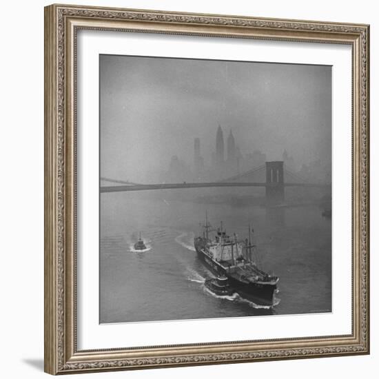 Downtown NY Seen through Mist Hovering over River, Yamashita Line Ship Coasting and Bridge-Eliot Elisofon-Framed Photographic Print