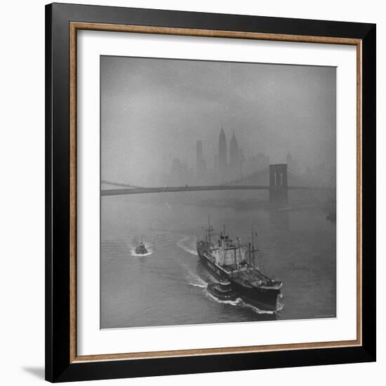 Downtown NY Seen through Mist Hovering over River, Yamashita Line Ship Coasting and Bridge-Eliot Elisofon-Framed Photographic Print