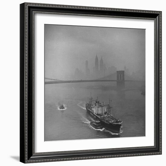 Downtown NY Seen through Mist Hovering over River, Yamashita Line Ship Coasting and Bridge-Eliot Elisofon-Framed Photographic Print