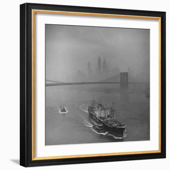 Downtown NY Seen through Mist Hovering over River, Yamashita Line Ship Coasting and Bridge-Eliot Elisofon-Framed Photographic Print