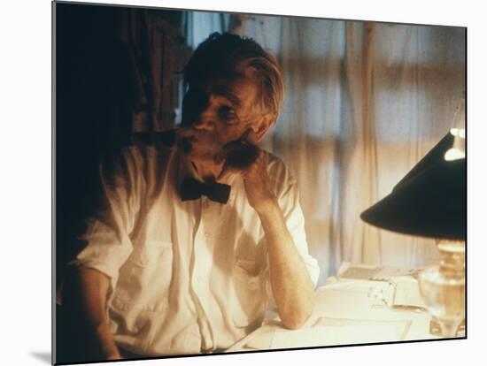 Dr. Albert Schweitzer at His Desk in His Small Office at the Lambarene Compound-George Silk-Mounted Premium Photographic Print