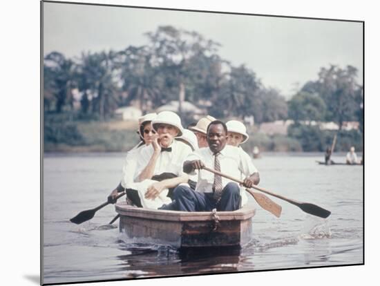 Dr. Albert Schweitzer Going Down the Ogowe River to Lambarene for His Birthday Celebration-George Silk-Mounted Premium Photographic Print