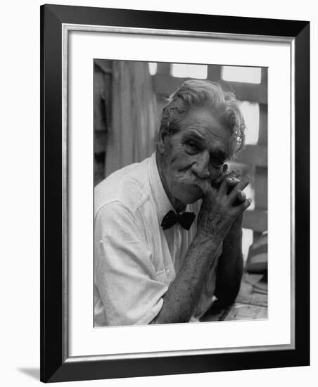 Dr. Albert Schweitzer, Medical Missionary and Humanitarian, Sitting in His Famous Hospital-null-Framed Premium Photographic Print