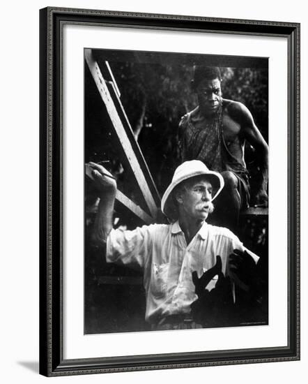 Dr. Albert Schweitzer, Medical Missionary and Humanitarian, with Carpenter at Site of His Hospital-W^ Eugene Smith-Framed Premium Photographic Print