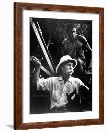 Dr. Albert Schweitzer, Medical Missionary and Humanitarian, with Carpenter at Site of His Hospital-W^ Eugene Smith-Framed Premium Photographic Print