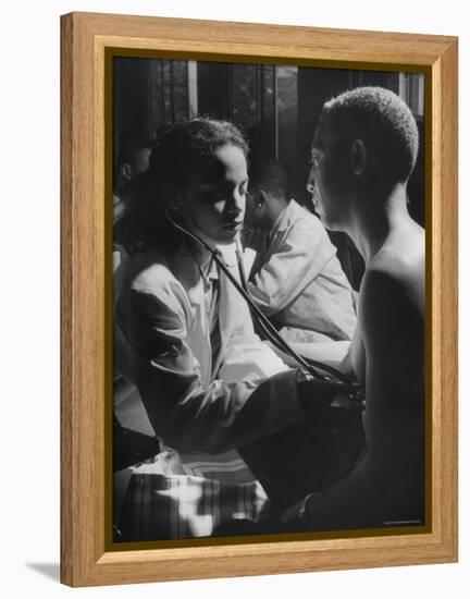 Dr. Carolyn Long, Listening to Patient John Wells Heart Beat-Ed Clark-Framed Premier Image Canvas