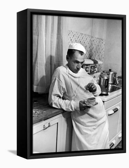 Dr. Ernest Ceriani in a State of Exhaustion, Having a Cup of Coffee in the Hospital Kitchen at 2 AM-W^ Eugene Smith-Framed Premier Image Canvas