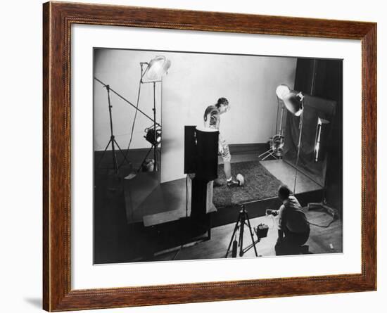 Dr. Harold E. Edgerton Taking Stroboscopic Picture of Joe Maniaci, Running Back of Chicago Bears-Gjon Mili-Framed Premium Photographic Print