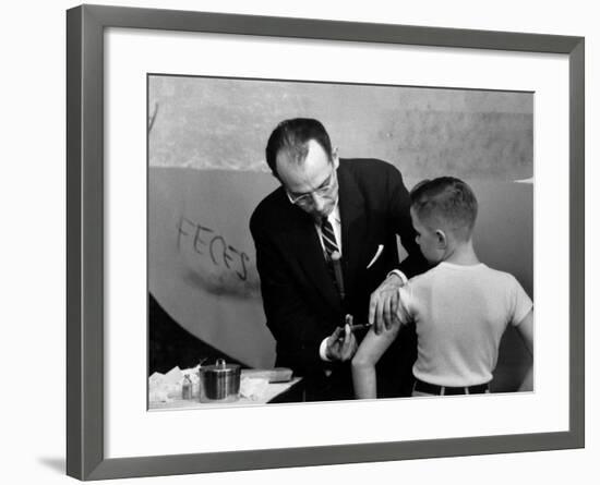 Dr. Jonas Salk Inoculating a Young Boy W. His New Polio Vaccine-null-Framed Premium Photographic Print