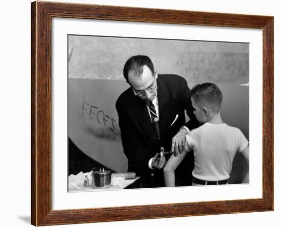 Dr. Jonas Salk Inoculating a Young Boy W. His New Polio Vaccine-null-Framed Premium Photographic Print