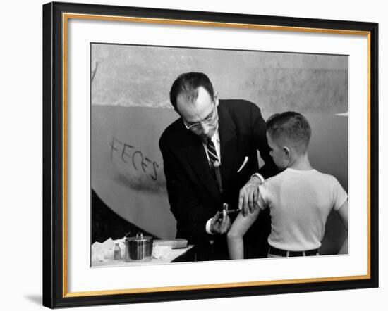 Dr. Jonas Salk Inoculating a Young Boy W. His New Polio Vaccine-null-Framed Premium Photographic Print