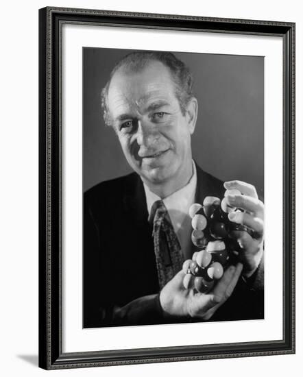 Dr. Linus Pauling Holding a Wooden Model of the Molecular Structure of Protein-Ralph Morse-Framed Premium Photographic Print