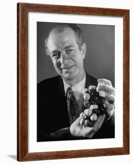 Dr. Linus Pauling Holding a Wooden Model of the Molecular Structure of Protein-Ralph Morse-Framed Premium Photographic Print