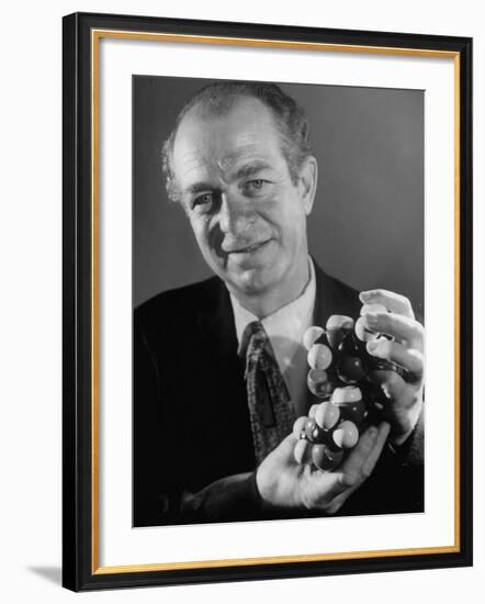 Dr. Linus Pauling Holding a Wooden Model of the Molecular Structure of Protein-Ralph Morse-Framed Premium Photographic Print