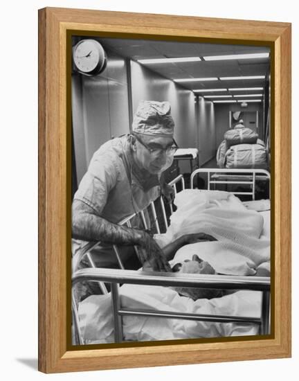 Dr. Michael E. Debakey, Chief Heart Surgeon at the Methodist Hospital-Ralph Morse-Framed Premier Image Canvas