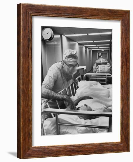 Dr. Michael E. Debakey, Chief Heart Surgeon at the Methodist Hospital-Ralph Morse-Framed Photographic Print