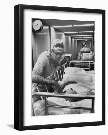 Dr. Michael E. Debakey, Chief Heart Surgeon at the Methodist Hospital-Ralph Morse-Framed Photographic Print