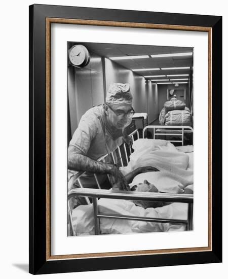 Dr. Michael E. Debakey, Chief Heart Surgeon at the Methodist Hospital-Ralph Morse-Framed Photographic Print