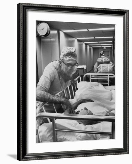 Dr. Michael E. Debakey, Chief Heart Surgeon at the Methodist Hospital-Ralph Morse-Framed Photographic Print