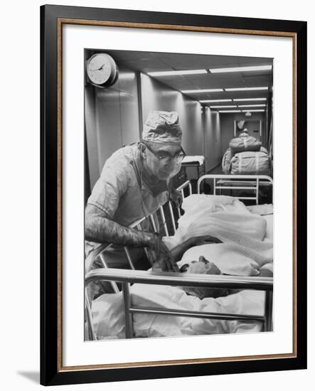 Dr. Michael E. Debakey, Chief Heart Surgeon at the Methodist Hospital-Ralph Morse-Framed Photographic Print