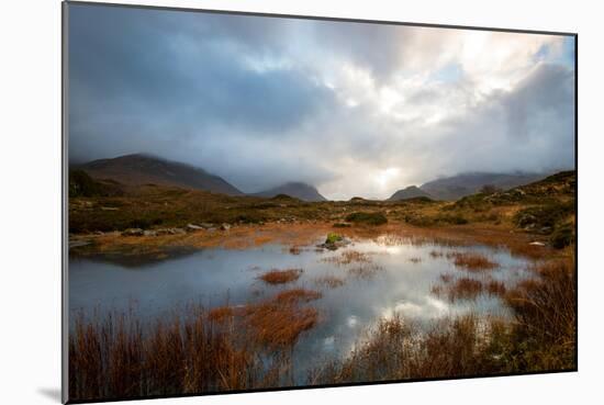 Dramatic Light Reflected in a Small Lochan at Sligachan, Isle of Skye Scotland UK-Tracey Whitefoot-Mounted Photographic Print