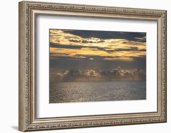 Dramatic skies, rain, sunbeams, sunset colors kiss the horizon of the Gulf of Mexico, Florida.-Sheila Haddad-Framed Photographic Print