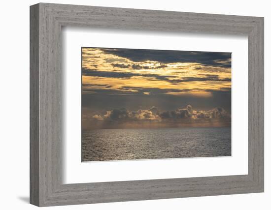 Dramatic skies, rain, sunbeams, sunset colors kiss the horizon of the Gulf of Mexico, Florida.-Sheila Haddad-Framed Photographic Print