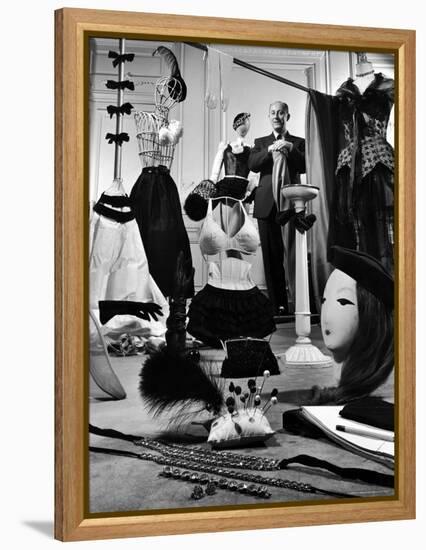 Dress Designer Christian Dior in His Workshop-Frank Scherschel-Framed Premier Image Canvas