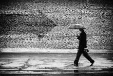 Wrong Way. A Man with Umbrella. Conceptual Image, Film Grain Added-Drop of Light-Framed Photographic Print