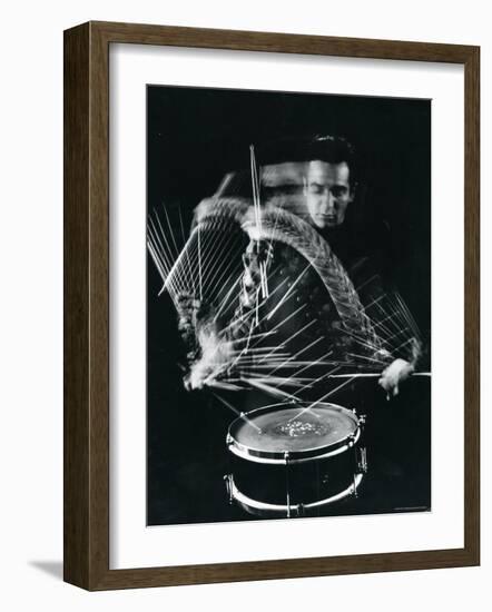 Drummer Gene Krupa Playing Drum at Gjon Mili's Studio-Gjon Mili-Framed Premium Photographic Print