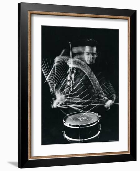 Drummer Gene Krupa Playing Drum at Gjon Mili's Studio-Gjon Mili-Framed Premium Photographic Print