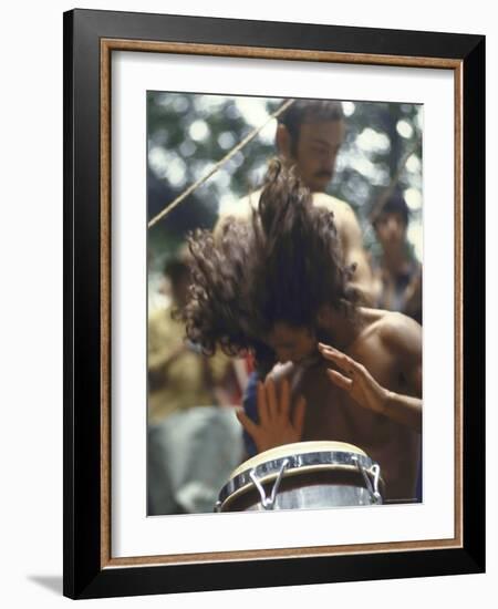 Drummer Playing Instrument with Hands During Woodstock Music Festival-Bill Eppridge-Framed Photographic Print
