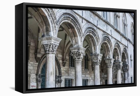 Dubrovnik, Croatia. Ornate columns at Sponza Palace.-Tom Haseltine-Framed Premier Image Canvas