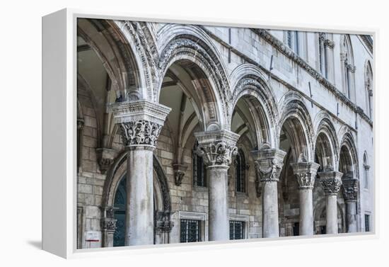 Dubrovnik, Croatia. Ornate columns at Sponza Palace.-Tom Haseltine-Framed Premier Image Canvas