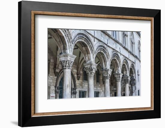 Dubrovnik, Croatia. Ornate columns at Sponza Palace.-Tom Haseltine-Framed Photographic Print