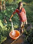 Boy at Water Tap, Chuka Village, Mount Kenya, Kenya, East Africa, Africa-Duncan Maxwell-Photographic Print