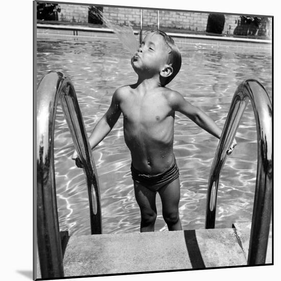 Duncan Richardson, 3-Year-Old Swimming Prodigy, Spouting Water Like a Whale, Town House Pool-Martha Holmes-Mounted Photographic Print