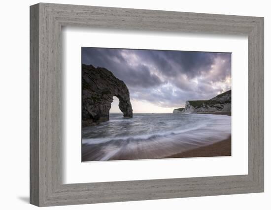Durdle Door, with incoming tide at sunset, near Lulworth, Dorset Jurassic coast, UK-Ross Hoddinott-Framed Photographic Print