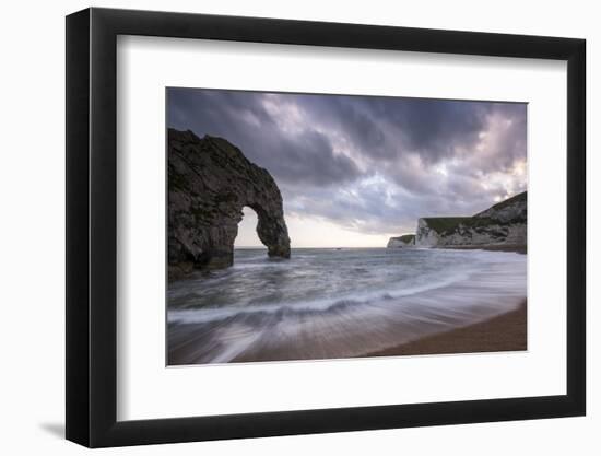 Durdle Door, with incoming tide at sunset, near Lulworth, Dorset Jurassic coast, UK-Ross Hoddinott-Framed Photographic Print