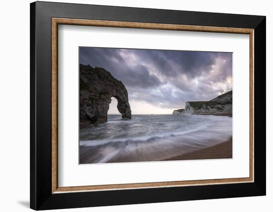 Durdle Door, with incoming tide at sunset, near Lulworth, Dorset Jurassic coast, UK-Ross Hoddinott-Framed Photographic Print