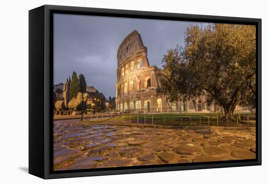 Dusk lights on the Colosseum, the old Flavian Amphitheatre, and symbol of the city, UNESCO World He-Roberto Moiola-Framed Premier Image Canvas